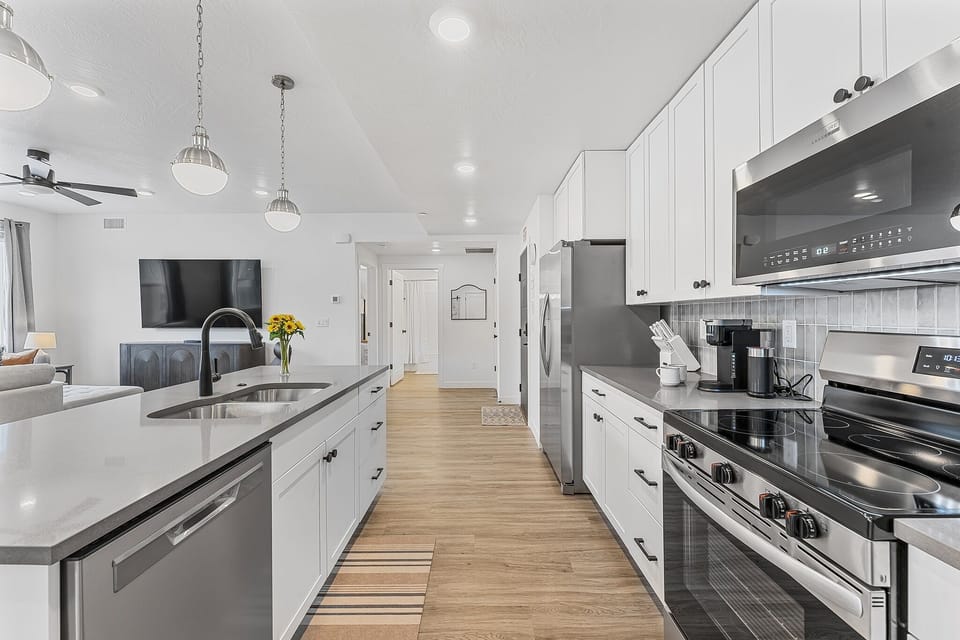 Condo, 2 Bedrooms | Private kitchen | Fridge, oven, coffee/tea maker, toaster