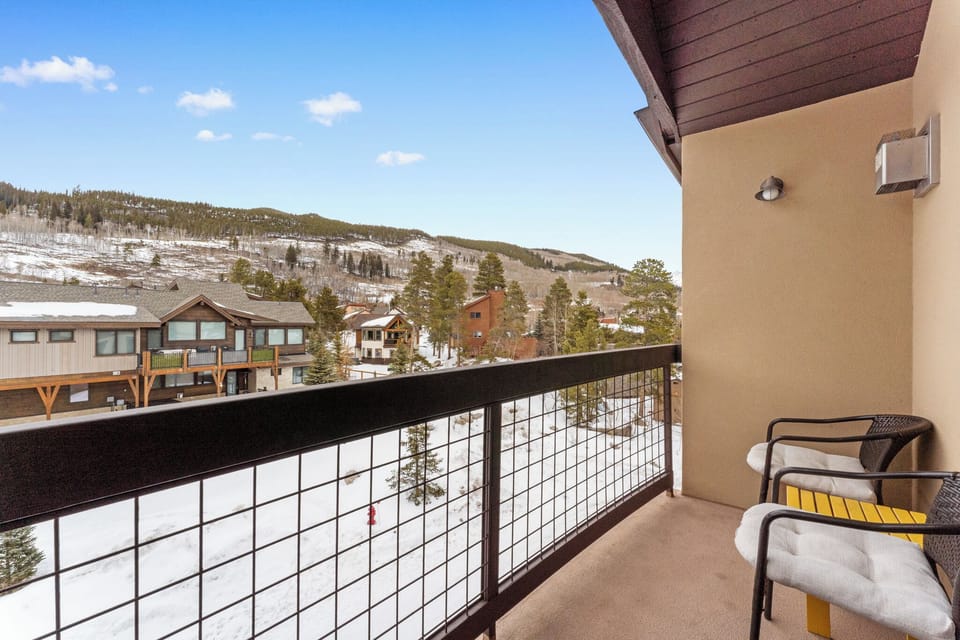 Step onto your private balcony to breathe in crisp mountain air while taking in stunning snowy slopes and valley views.