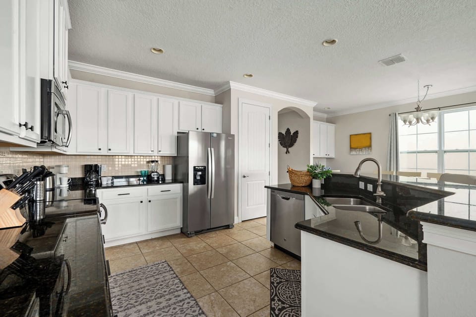 Fully equipped kitchen with stainless steel appliances