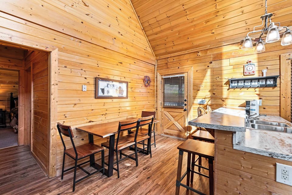 Cozy living space with leather seating, Smart TV, and gas fireplace 