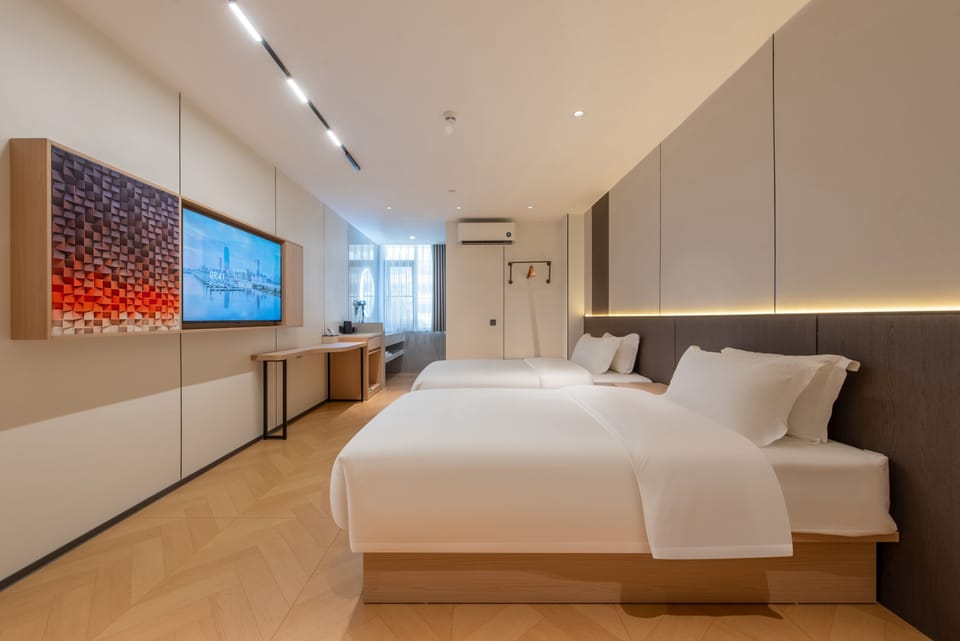 Elite Twin Room | Premium bedding, down comforters, memory foam beds, desk