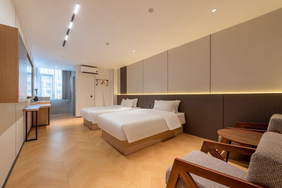 Elite Twin Room | Premium bedding, down comforters, memory foam beds, desk