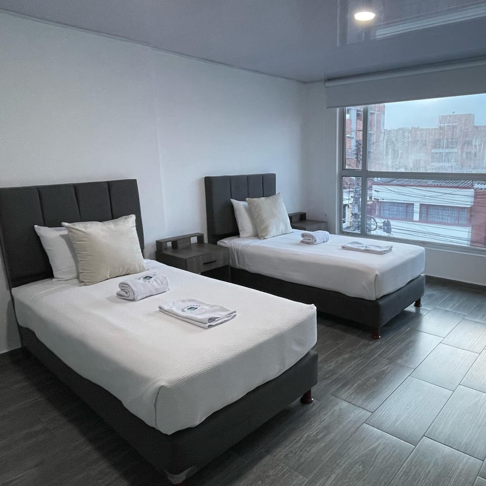Premium bedding, laptop workspace, free WiFi, bed sheets