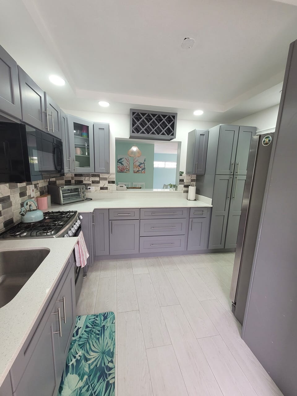 Fully equipped kitchen with plenty of counter space and storage