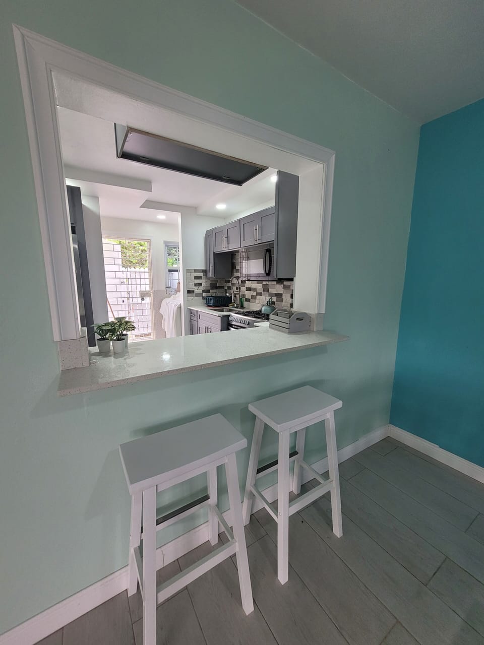 Cozy breakfast nook connected to the kitchen for easy mornings