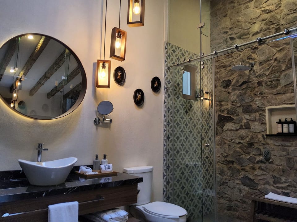 Basic Apartment | Bathroom | Shower, hair dryer, bathrobes, towels