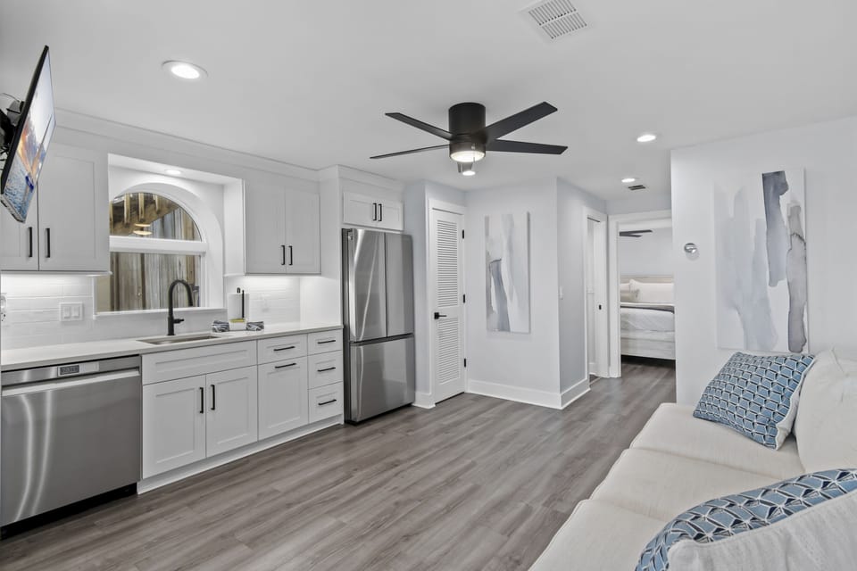 The 1st Floor features another Living Room w/ 50" Smart TV, Pre-loaded Game Console, a Kitchenette, and Patio Access - Great for the Kids!