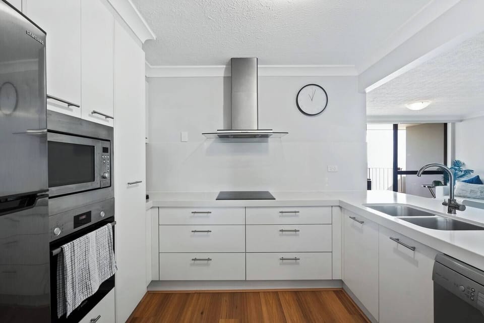The kitchen comes fully equipped for your holiday catering with sleek appliances and cooking utensils.
