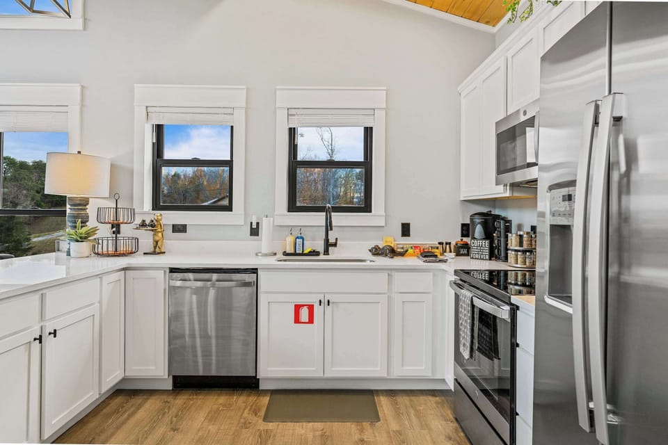 Enjoy the convenience of a large, full-size refrigerator with plenty of room for groceries, drinks, and snacks—ideal for longer stays and group trips.