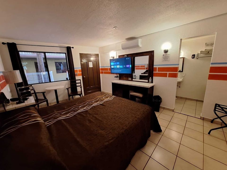 Comfort Room, Garden View | Laptop workspace, free WiFi, bed sheets