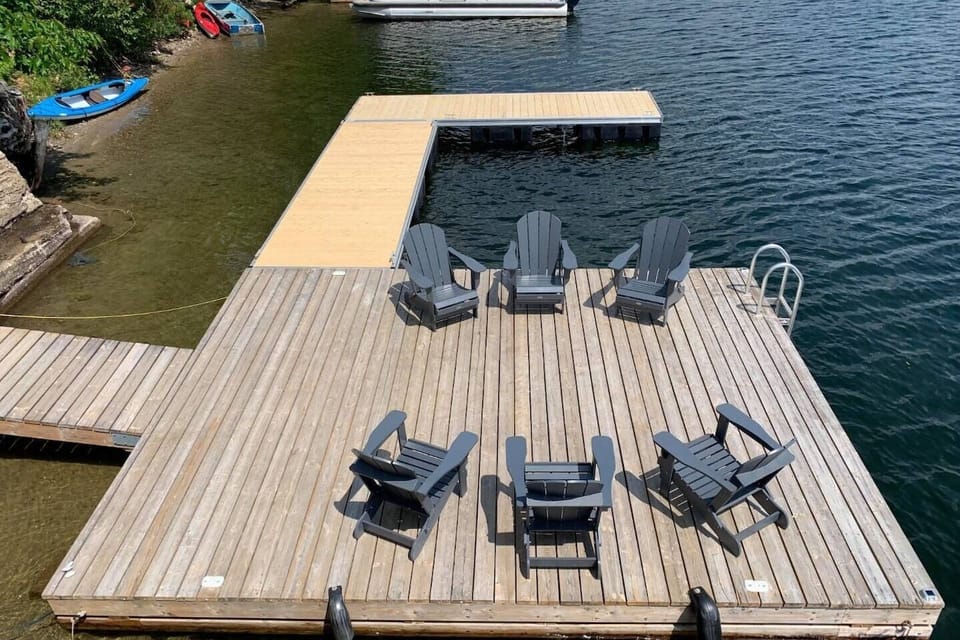 Spacious dock and seating area on the lake