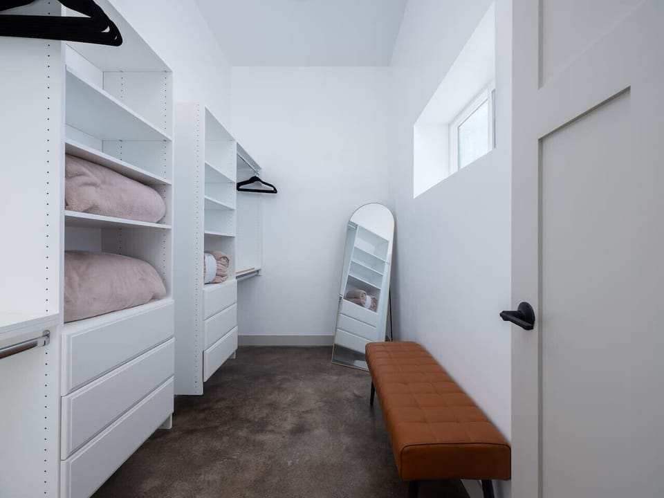Primary bedroom walkin closet