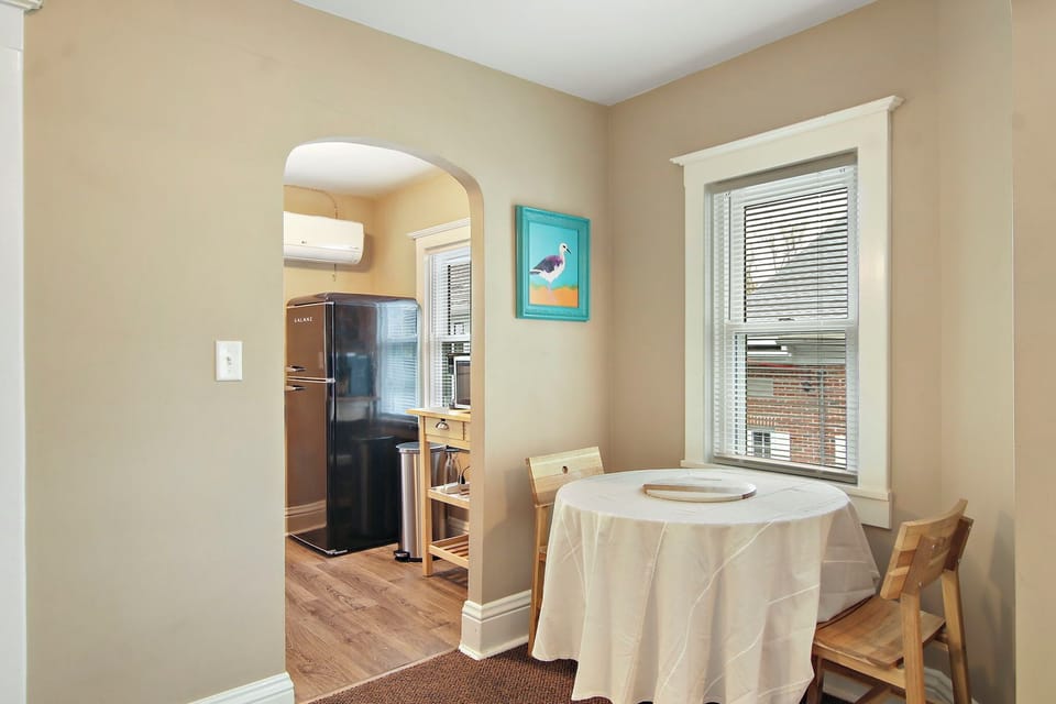 Dining table, looking into kitchenette (no stove, but microwave)