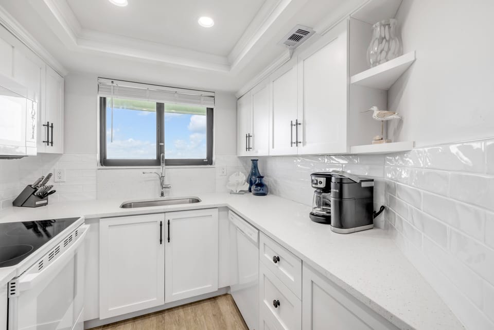 Wake up with coffee in the updated kitchen, featuring both a Keurig and a standard drip coffee maker