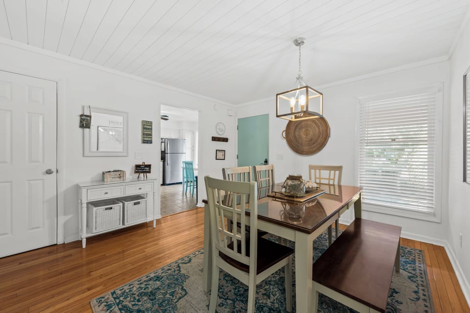The convenient dining area is near the kitchen for easy serving.