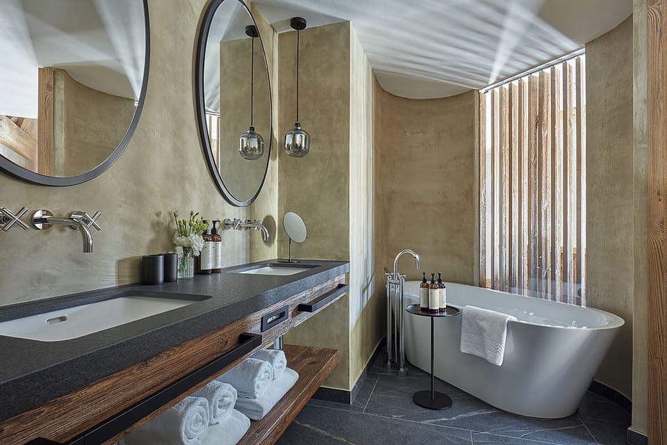 Luxury Suite, Balcony, Mountain View | Bathroom | Bathrobes, slippers, towels, soap