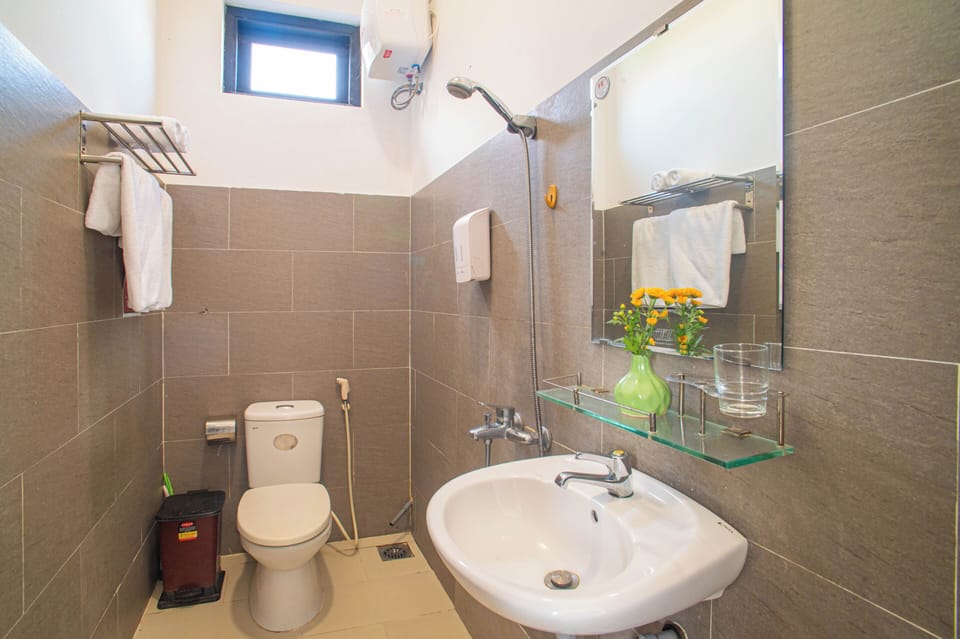 Hair dryer, slippers, towels, soap
