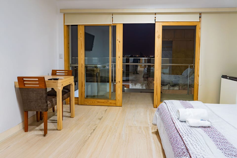 Family Quadruple Room, 2 Bedrooms, Balcony, Pool View | Egyptian cotton sheets, premium bedding, down comforters