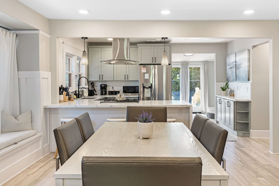 Modern dining and kitchen area - perfect for any occasion.