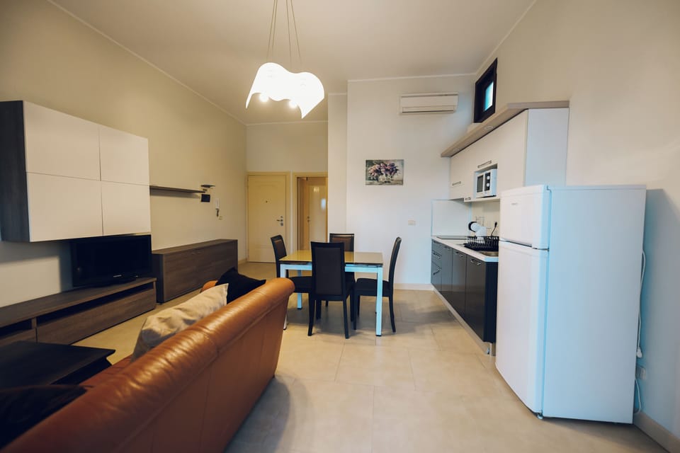 Comfort Apartment | Private kitchen | Fridge, microwave, oven, stovetop