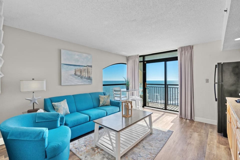 Rise to the refreshing radiance of sunlight streaming into this elegant living and dining space. From sunrise to sunset, enjoy panoramic views of the ocean and resort. This condo offers a remarkable escape, perfect for relaxation and tranquility.