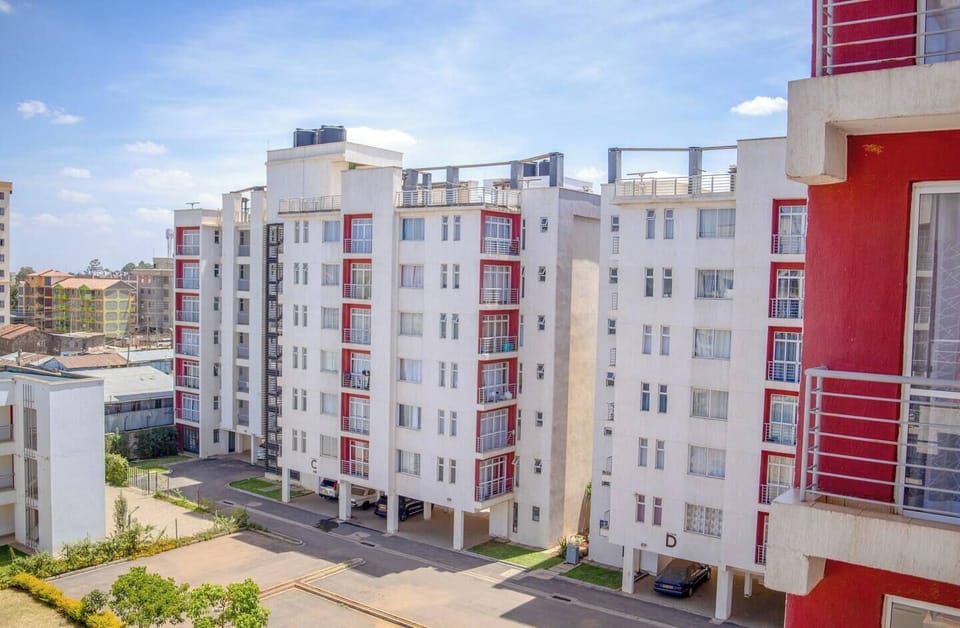 A view of how the exterior of the apartments look, at the bottom of the photo you can see the ample free parking provided below