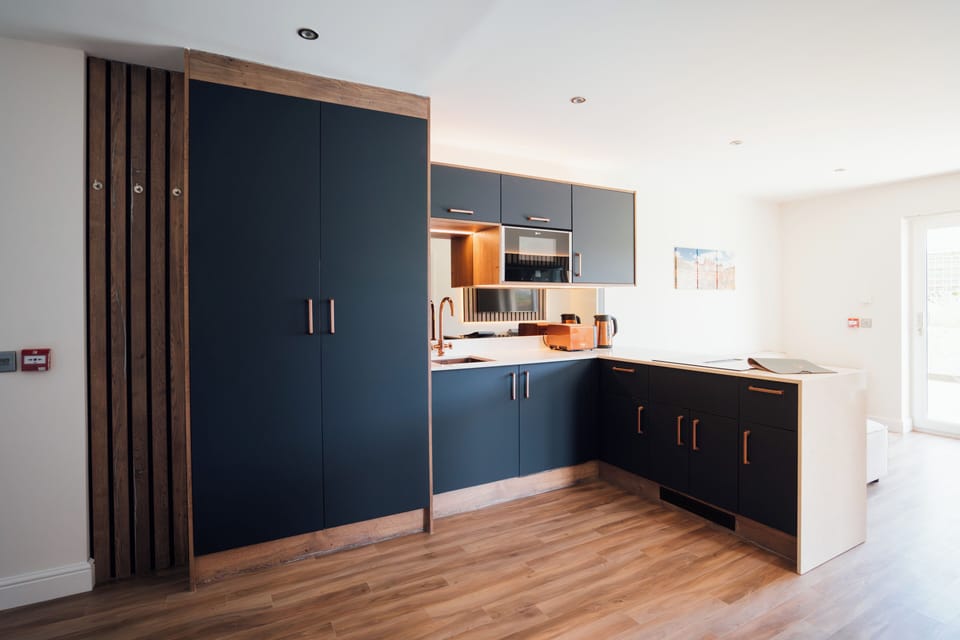 Signature Suite, 2 Bedrooms, Kitchenette | Private kitchenette | Microwave, electric kettle, toaster
