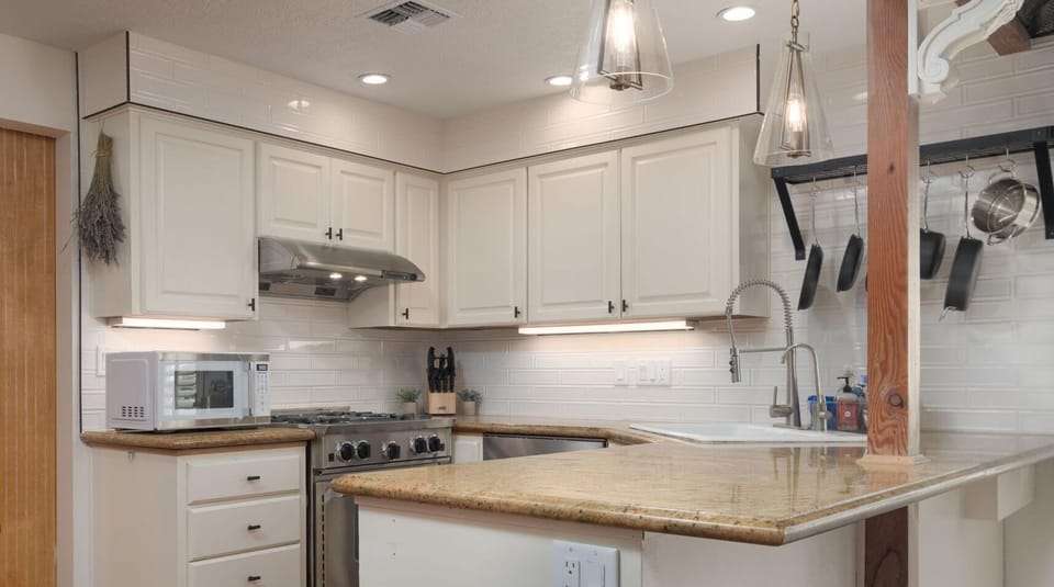 Spacious layout makes meal prep and gathering effortless and enjoyable.