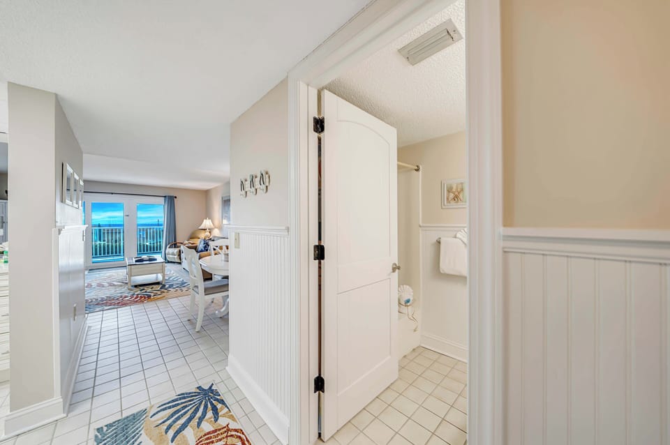 There is an additional full bathroom located off the hall with a tub/shower combo.