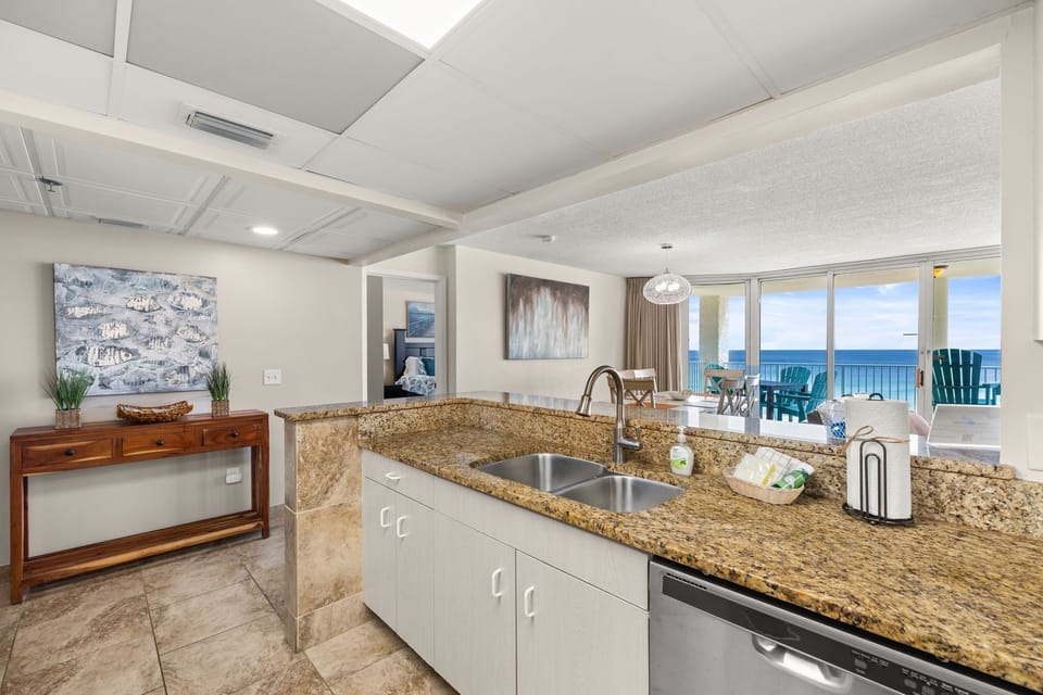 The fully equipped kitchen features granite countertops, stainless-steel appliances, and has everything you need to prepare meals for family & friends.