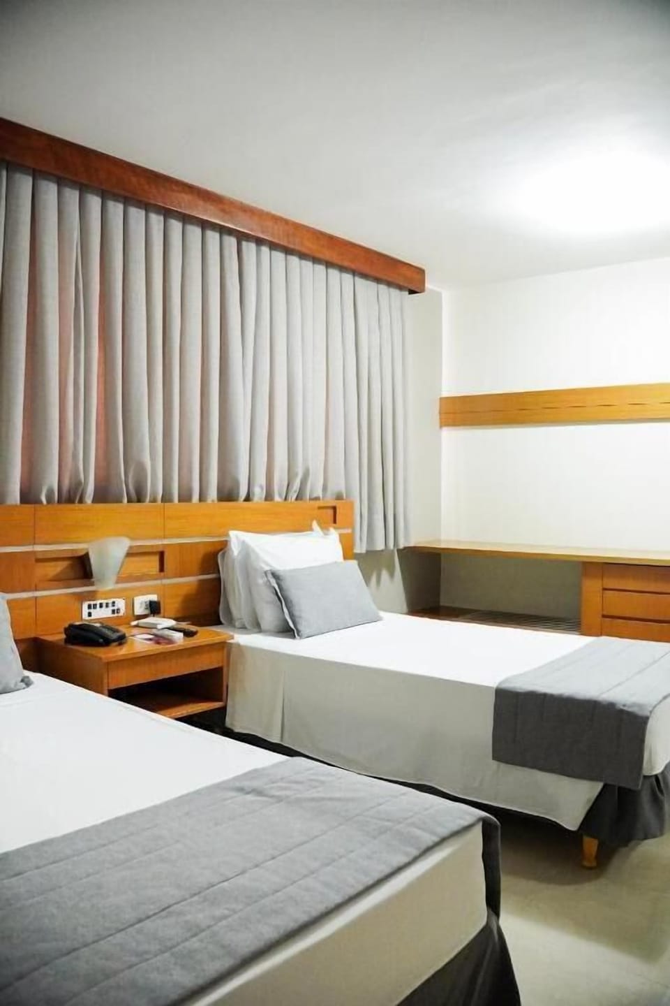 Hypo-allergenic bedding, minibar, desk, blackout drapes