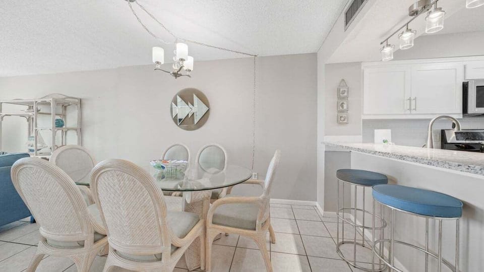 Dining table with seating for six plus two at the bar