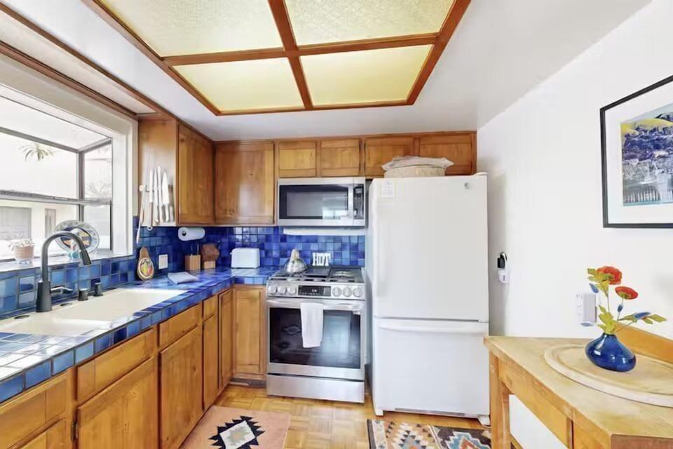 Create delicious meals in a sleek kitchen outfitted with modern appliances.