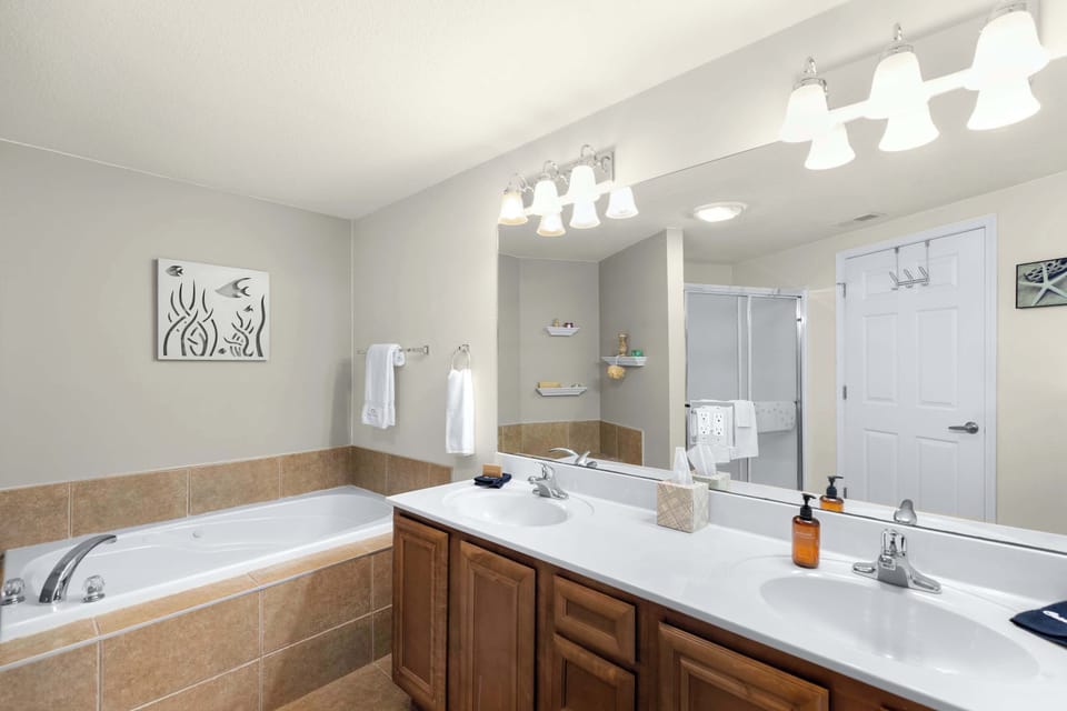 Ensuite bathroom with separate shower, and tub 