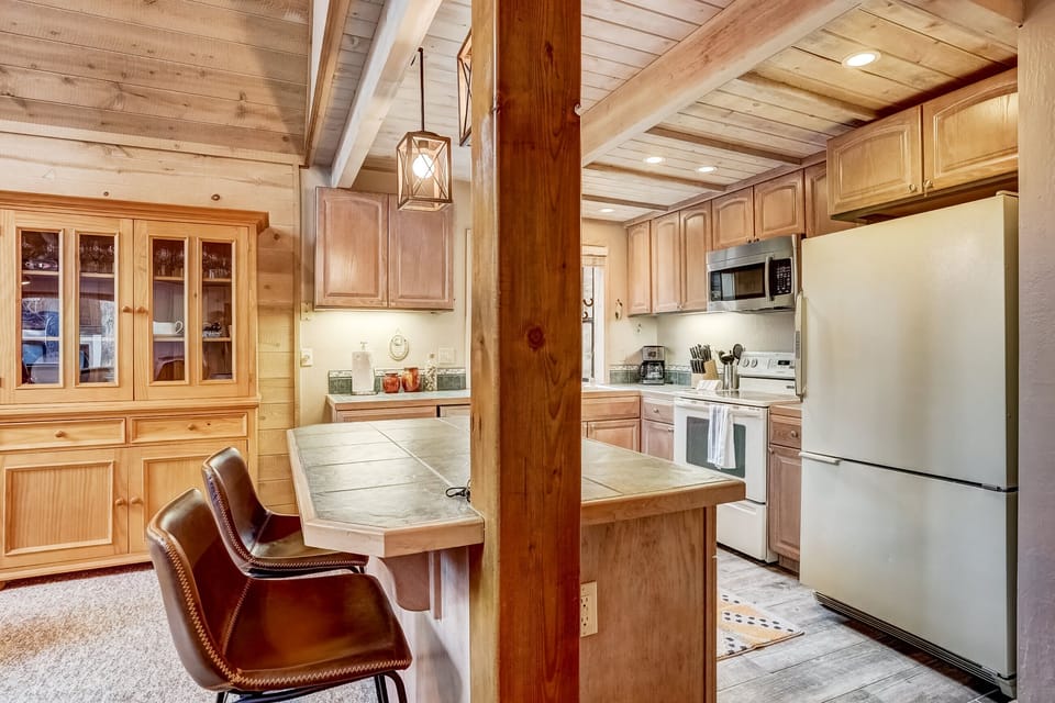 Kitchen with drip coffee maker, dishwasher, microwave and more