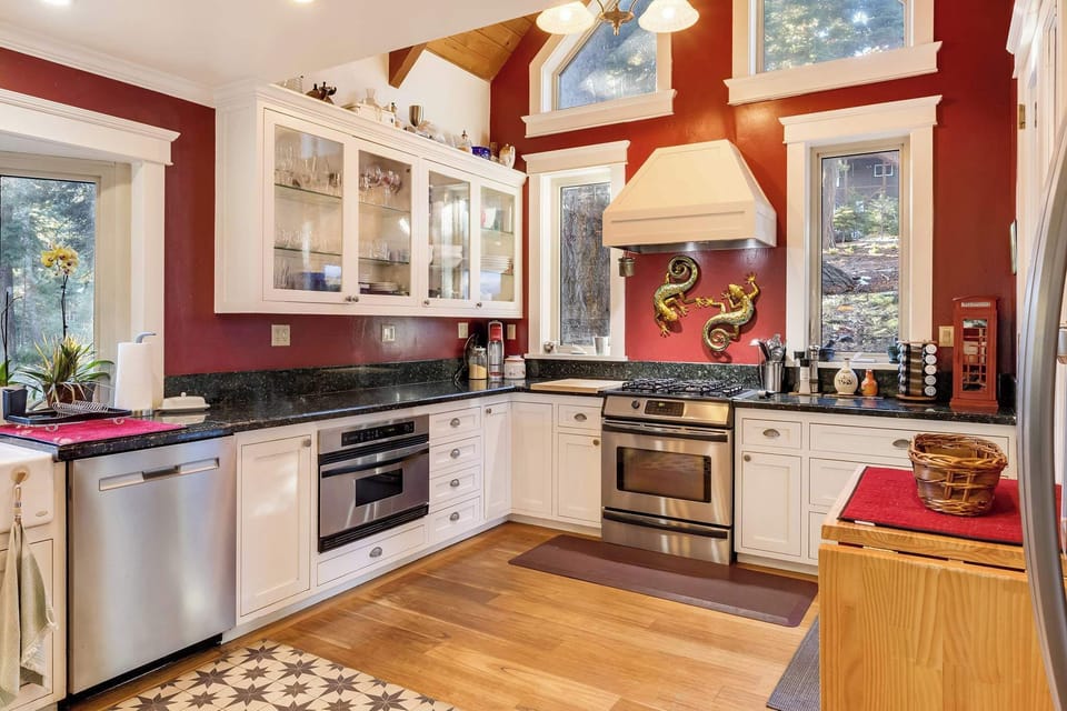 The kitchen offers ample storage space & all the comforts of home
