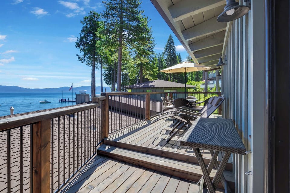 Lounge chairs and outdoor dining on the balcony