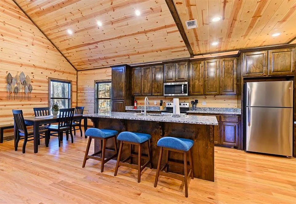 The heart of the home, this bright and spacious kitchen flows seamlessly into the dining and living areas, creating the perfect gathering space.