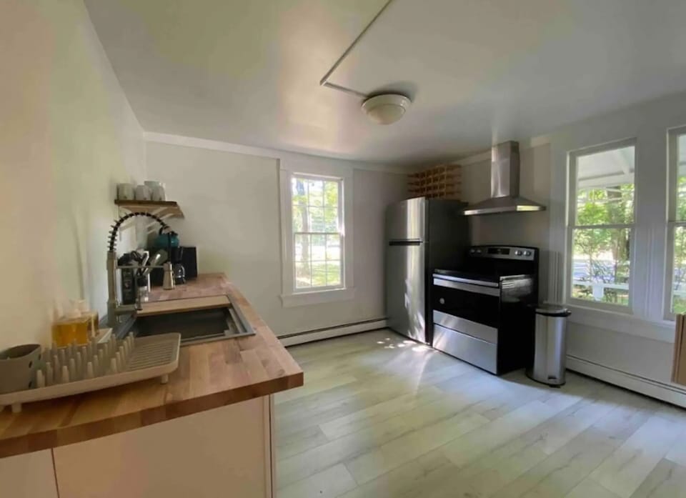 Renovated kitchen with new stainless steel appliances