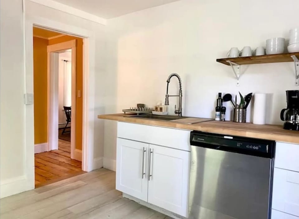Renovated kitchen with new stainless steel appliances