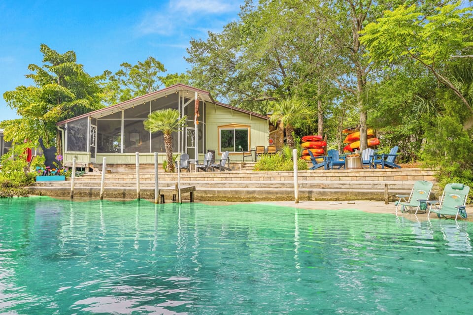 Enjoy clear Weeki Wachee River waters with direct access to lounge, boat or swim