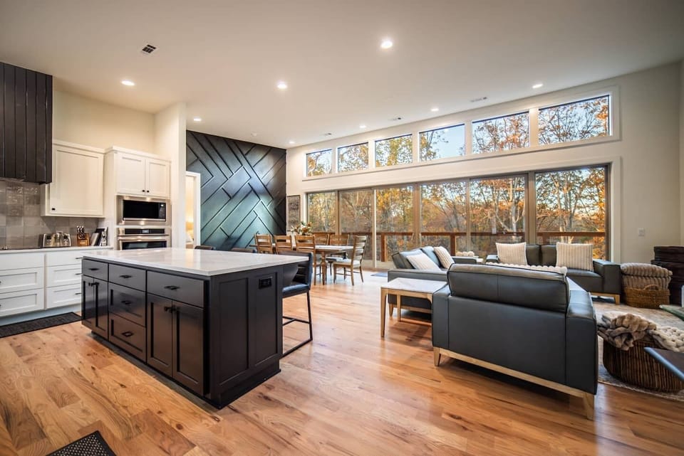 [Kitchen and Living Room] Large Tv and Space for entertaining! Kitchen extremely well equipped for anything you and your group may need!