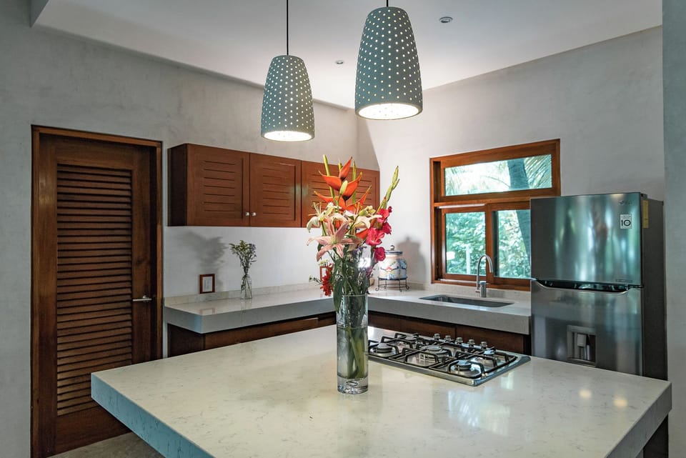 Deluxe Suite, Balcony, Beach View | Private kitchen