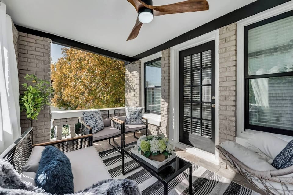 Private balcony with comfortable seating and plenty of space for both relaxing and entertaining.
