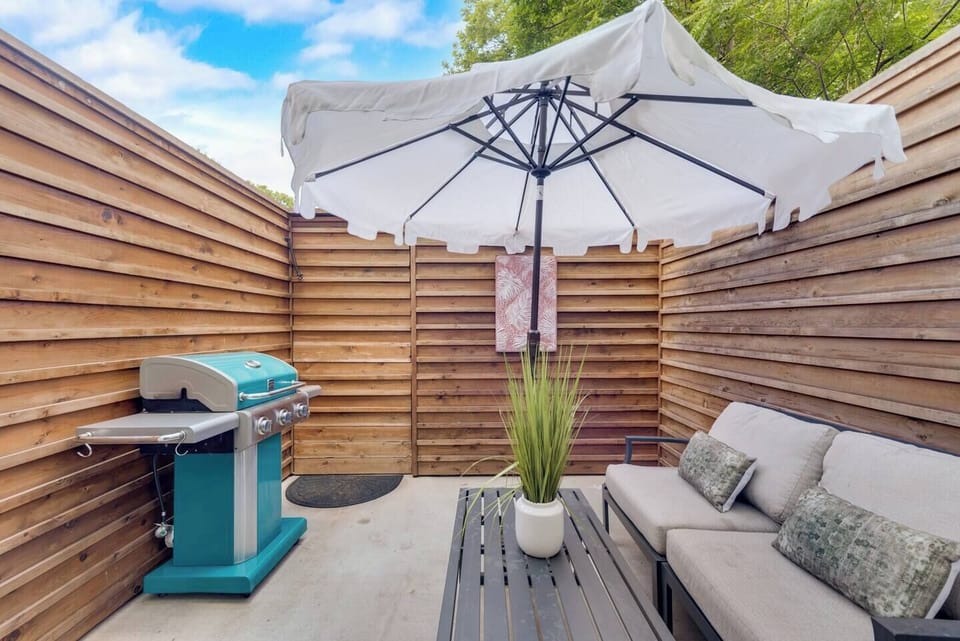 Private Patio with plenty of seating and a grill to cook your favorite BBQ. 