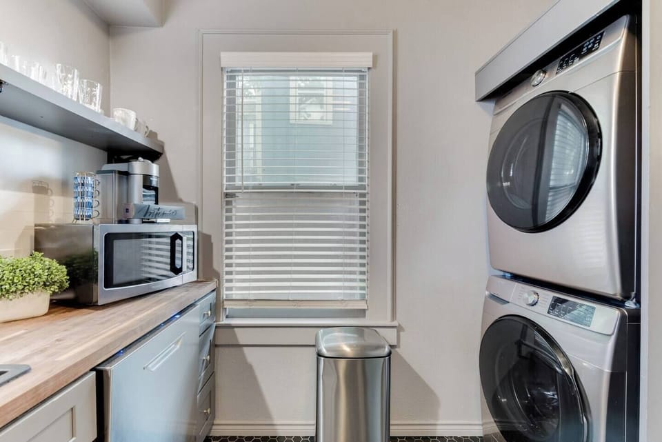 The unit comes with a convenient stackable washer and dryer, making laundry a breeze during your stay.