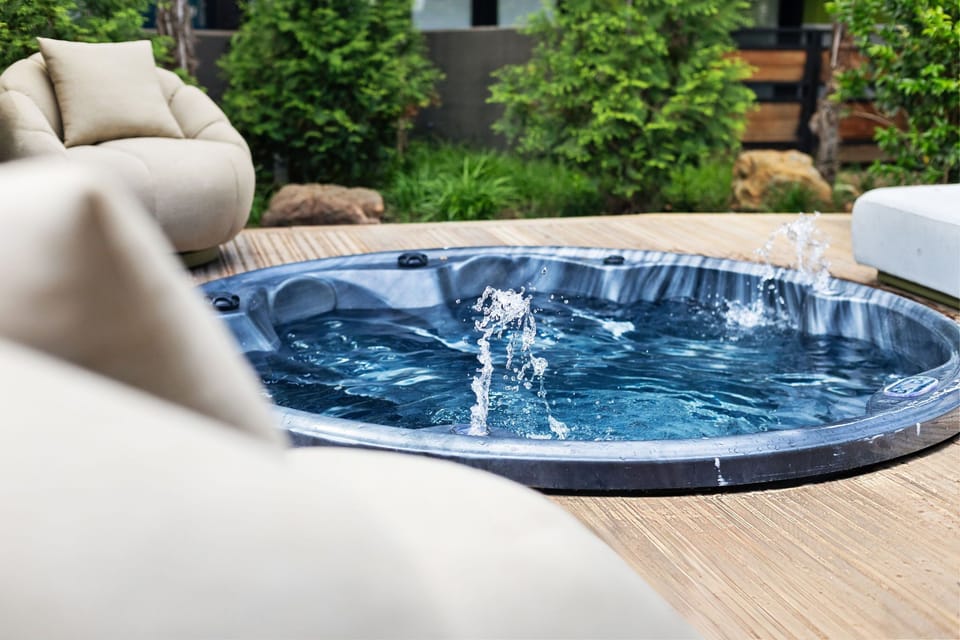 Resort-style courtyard and dry sauna, cold plunge, Jacuzzi and pool for rejuvenation and spa inspired 