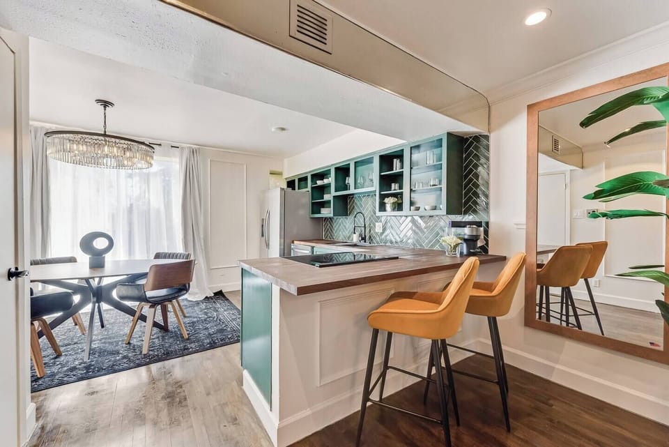Stylish bar seating at the bar, perfect for casual meals or chatting with the chef.