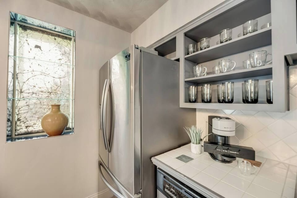 A spacious, modern stainless steel refrigerator to keep your food and drinks fresh during your stay.