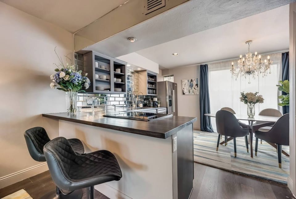 Stylish bar seating at the bar, perfect for casual meals or chatting with the chef.